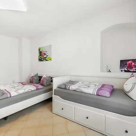 Апартаменты Modern In With A Terrace In